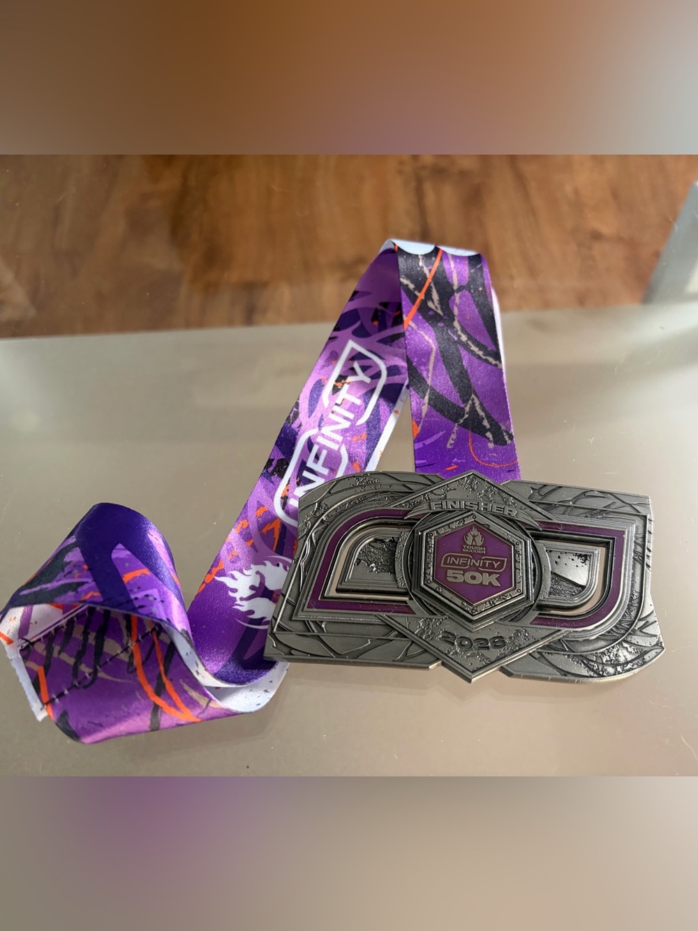 Tough Mudder Infinity 50K Finisher Medal with Ribbon